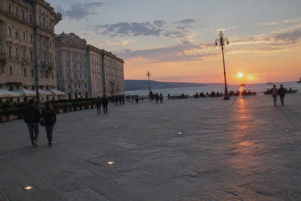 The seafront of Trieste, Italy, with Piazza Unità d'Italia and the Gulf of Trieste at dusk