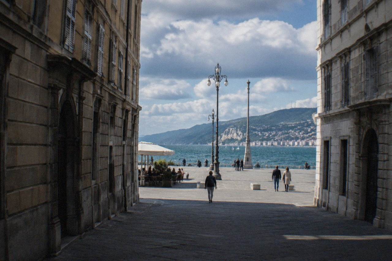 The seafront square of Trieste in Italy with the sea and hills behind it