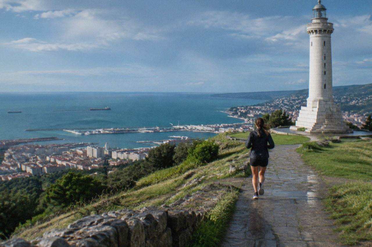 The seafront of Trieste with the Victory Lighthouse and the Adriatic gulf in the background