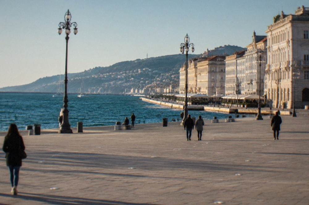 The seafront of Trieste with the historic buildings of Piazza Unità d'Italia facing the water