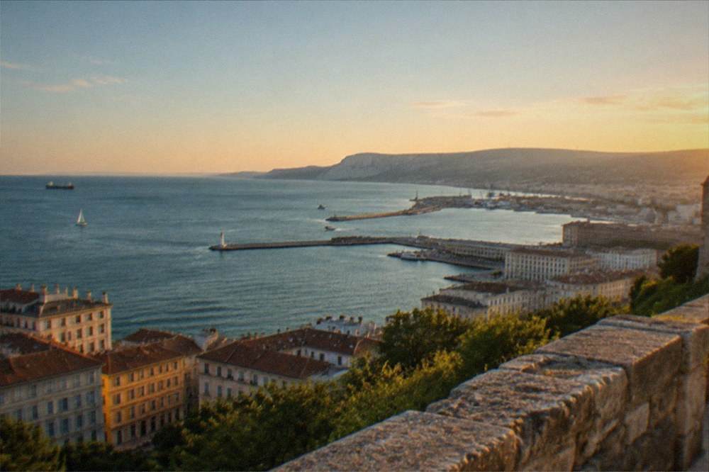 A wide view over the Gulf of Trieste from the castle walls at golden hour