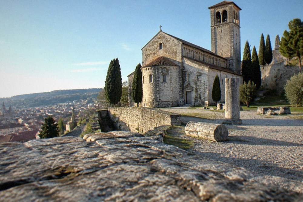 The cathedral and castle walls on San Giusto hill above Trieste's rooftops