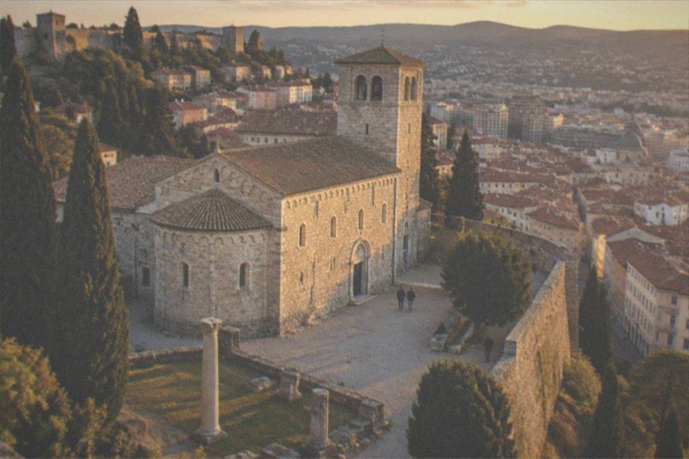 The Castello di San Giusto and the cathedral above the rooftops of Trieste's old town